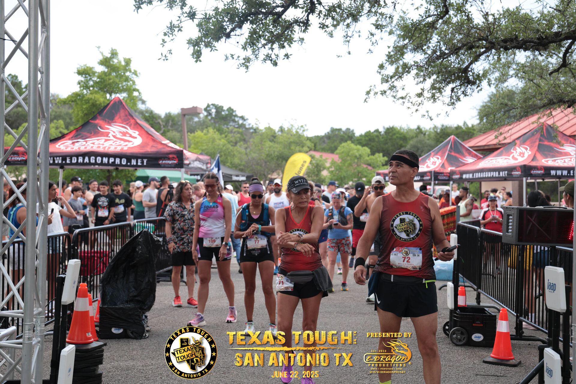 Racers under the Start / Finish arch